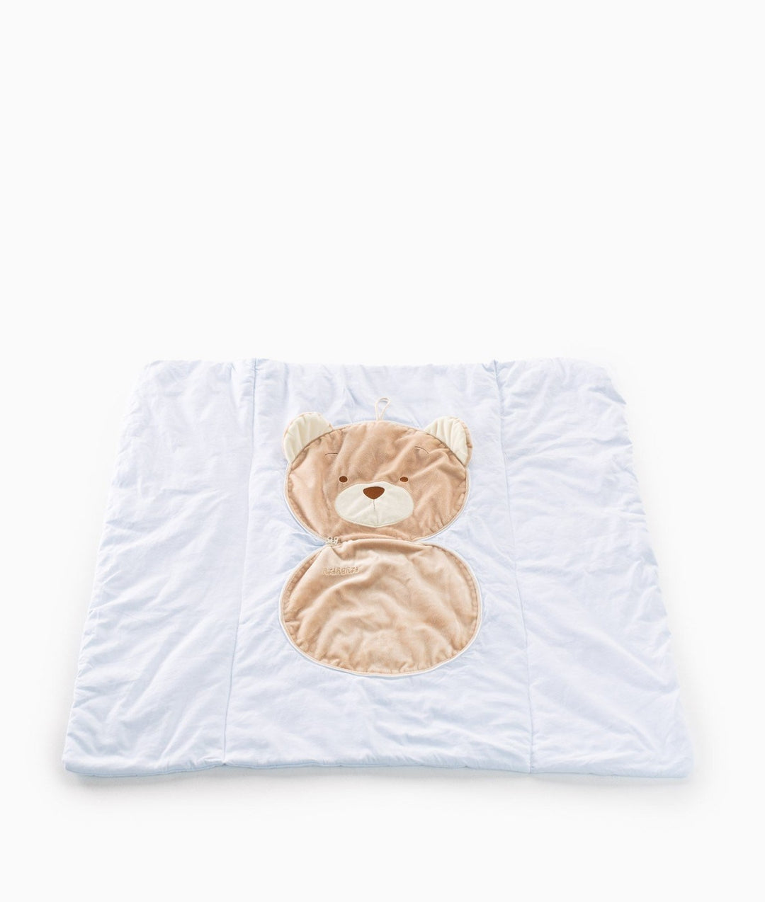 Fully expanded light blue convertible travel blanket with attached bear head