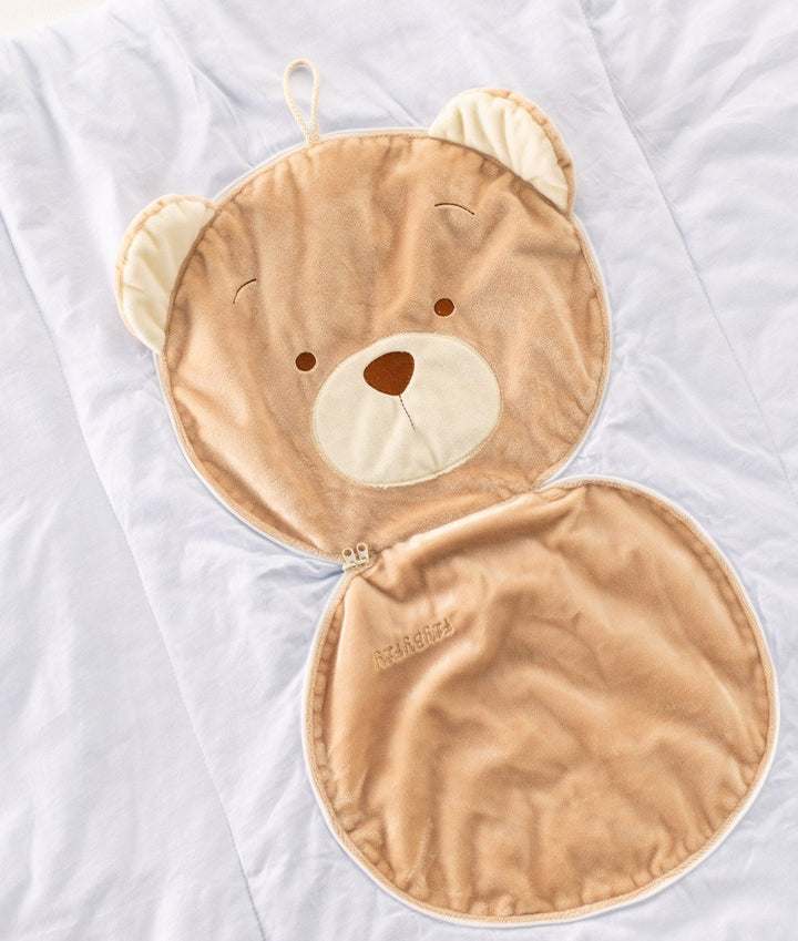 Tan bear travel blanket unfolded showing zipper conversion and embroidered logo