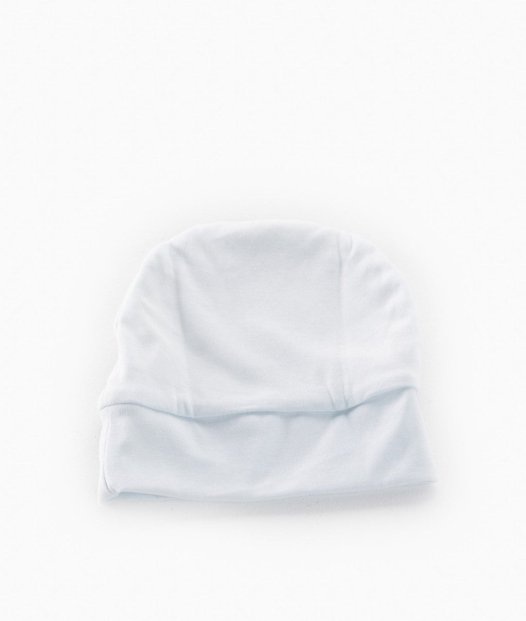 back view of plain light blue baby beanie showing smooth seamless interior and folded ribbed cuff