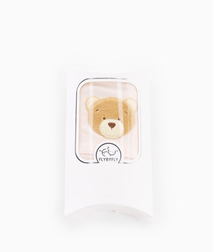 Pink baby beanie in white pillow box packaging with clear window and logo sticker