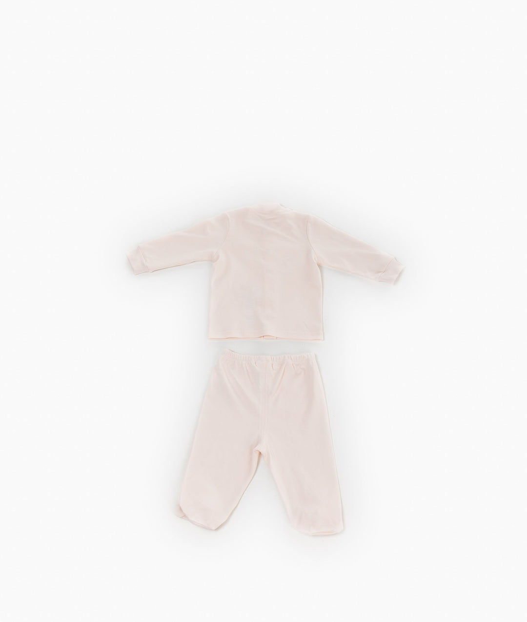 Back view of light pink baby pajama set showing plain top and elastic waist trousers