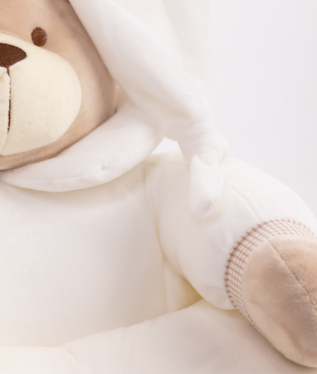 White and beige cuddle chair for babies and toddlers