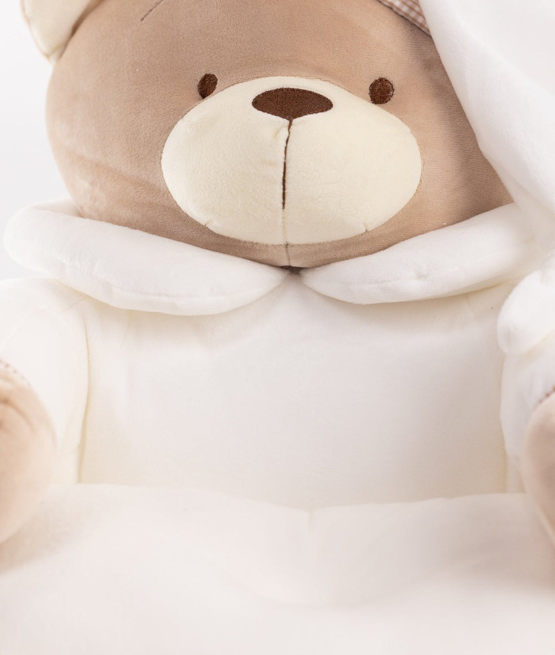 White and beige cuddle chair for babies and toddlers