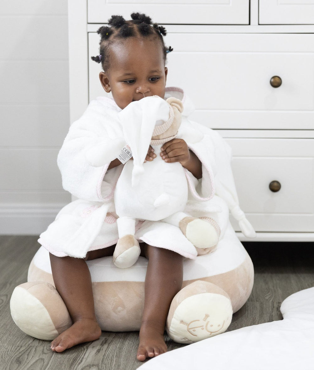 White and beige cuddle chair for babies and toddlers