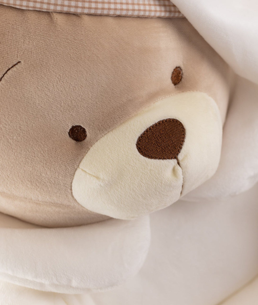 White and beige cuddle chair for babies and toddlers