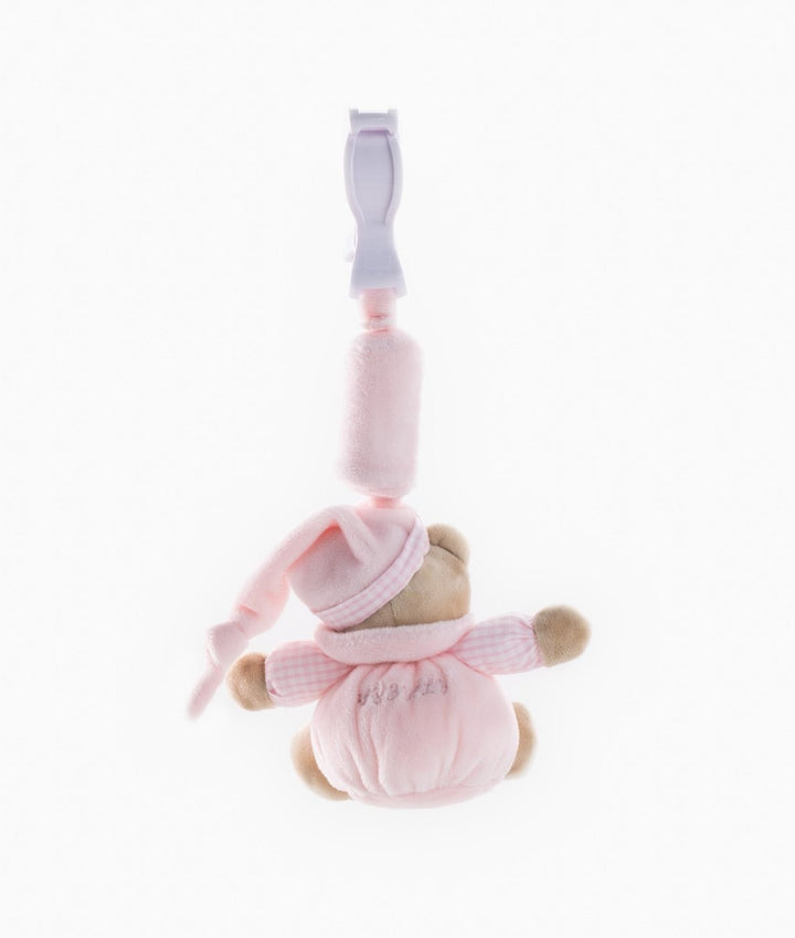 Back view of pink sensory bear toy attached to white clip mechanism