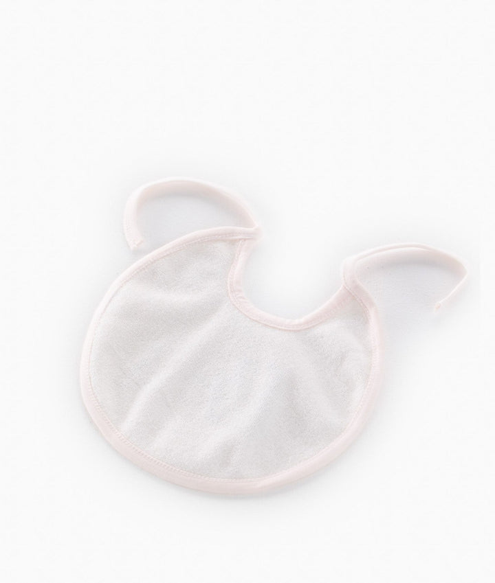 Back view of pink baby bib showing smooth absorbent inner fabric texture and curved neck binding