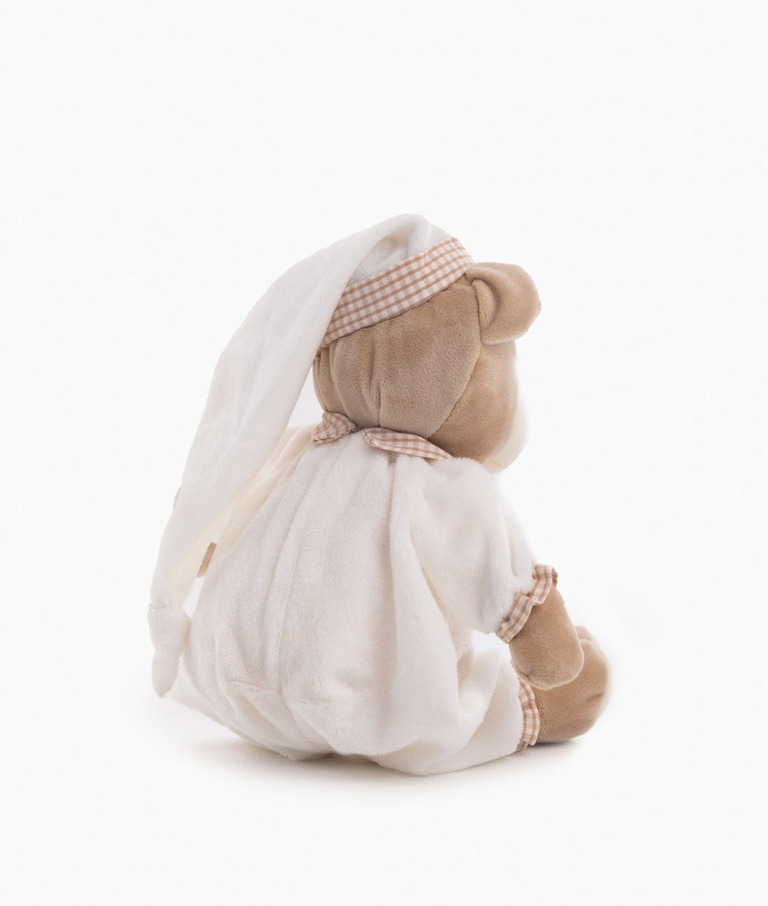 Back view of Cuddle Bear seated in white hooded outfit with draped hood and gingham neck tie