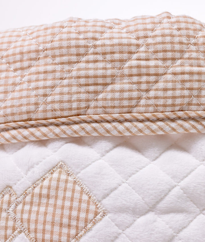 Baby nappy caddy for nursery in white and beige