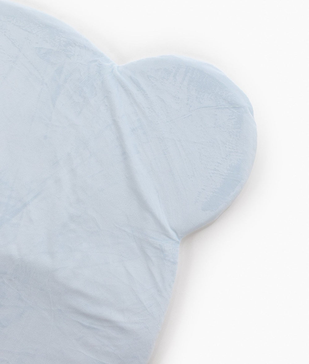 Light blue bear head playmat close-up showing soft silky fabric texture and rounded ear contour