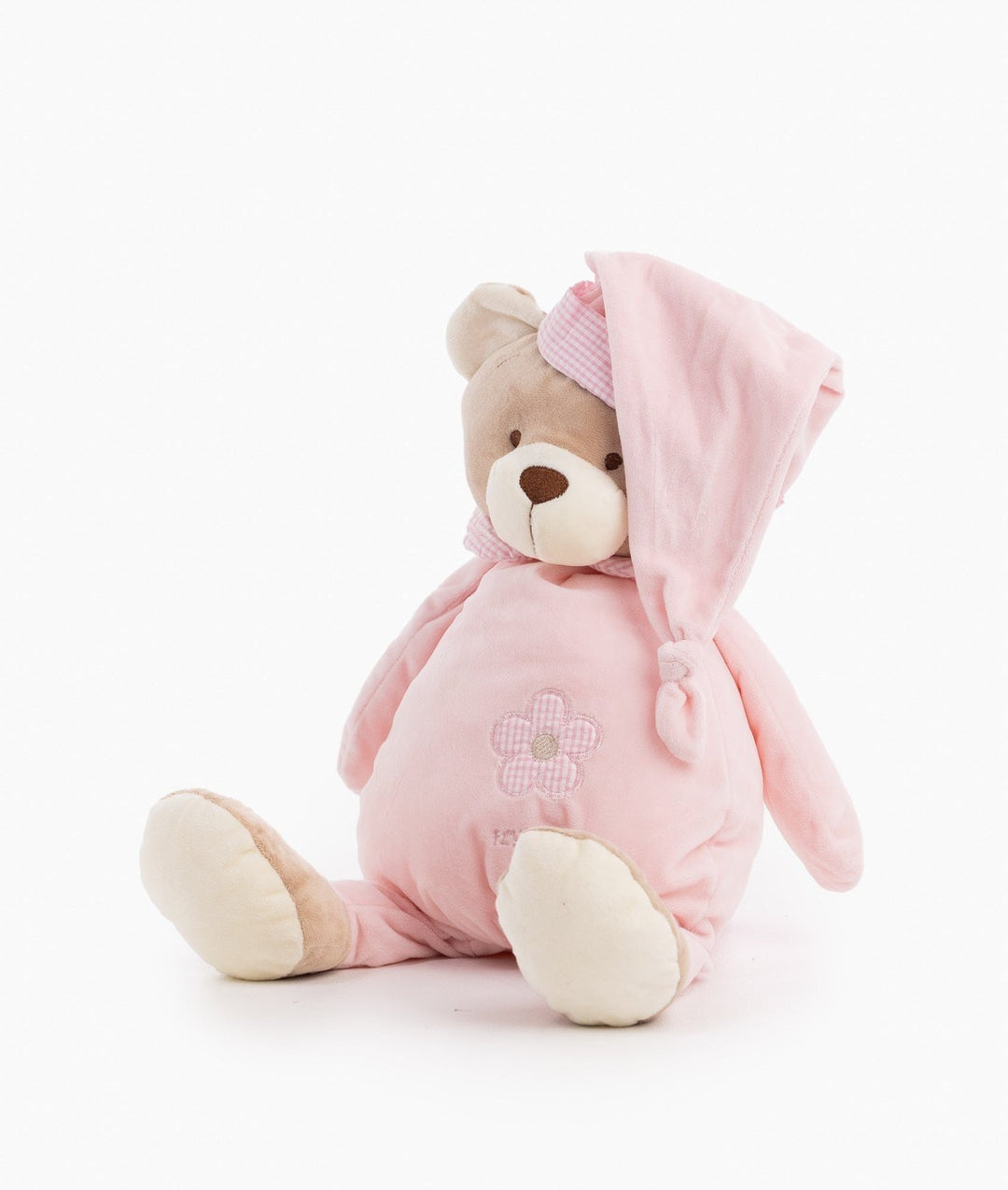 Front angle of pink stuffed bear highlighting cream paw pads and soft texture