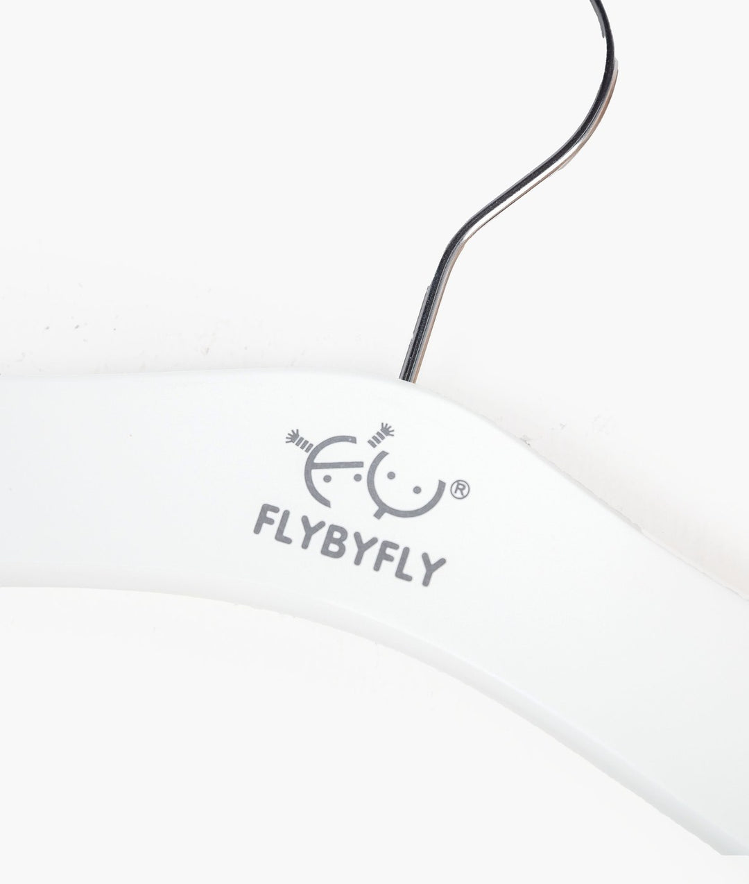 White and beige wooden hanger with clips