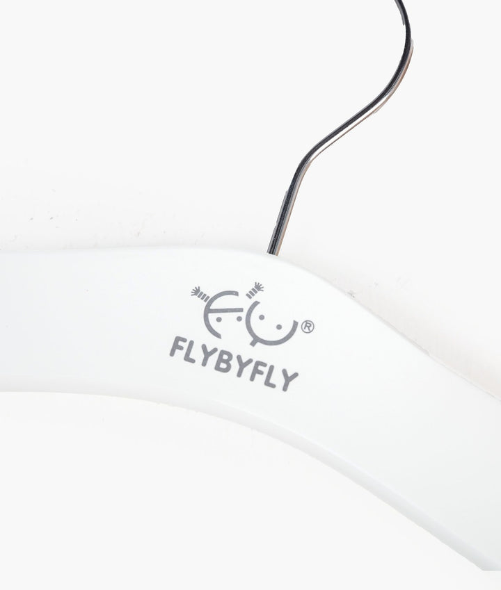 White and beige wooden hanger with clips