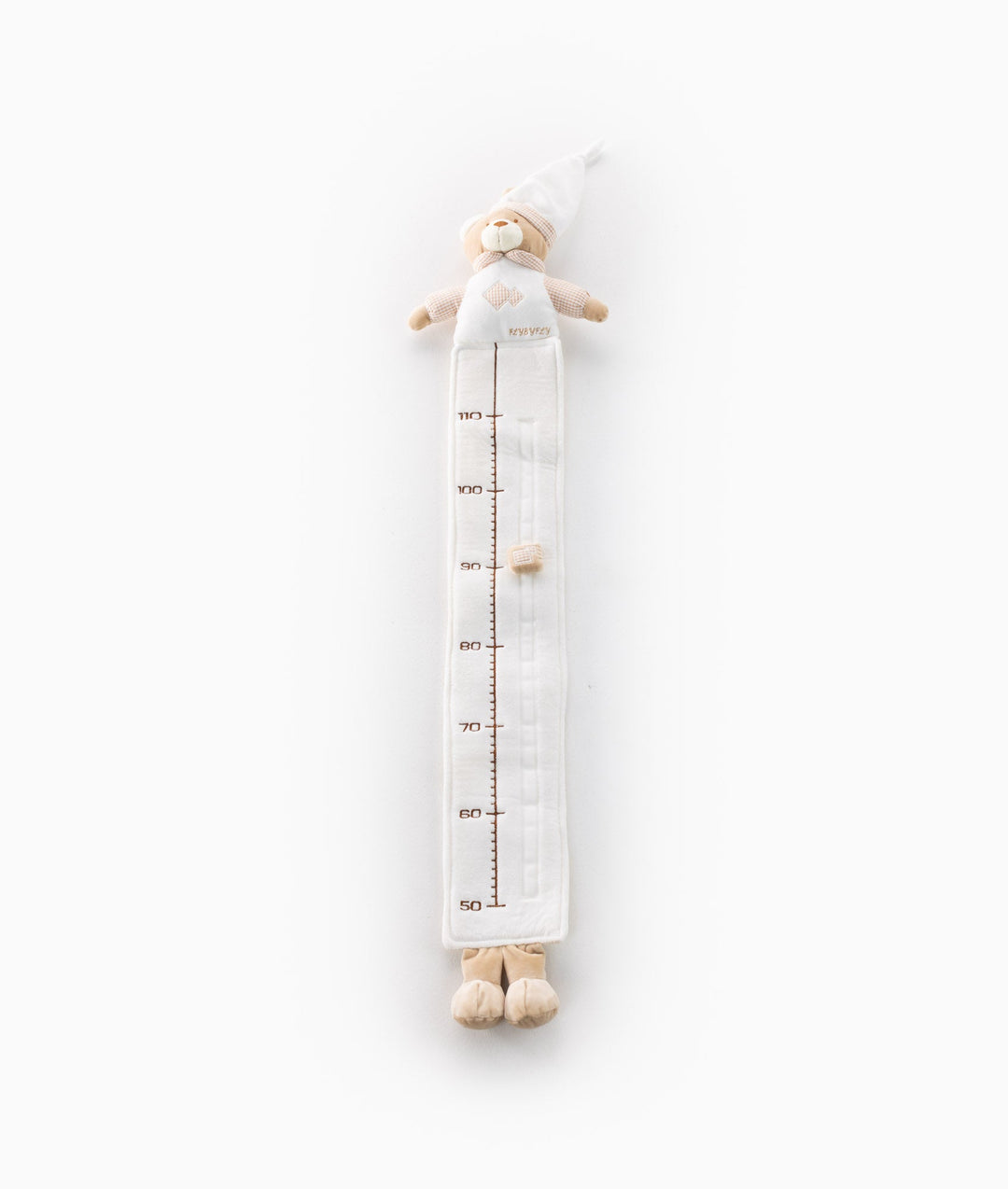 White and beige baby growth chart