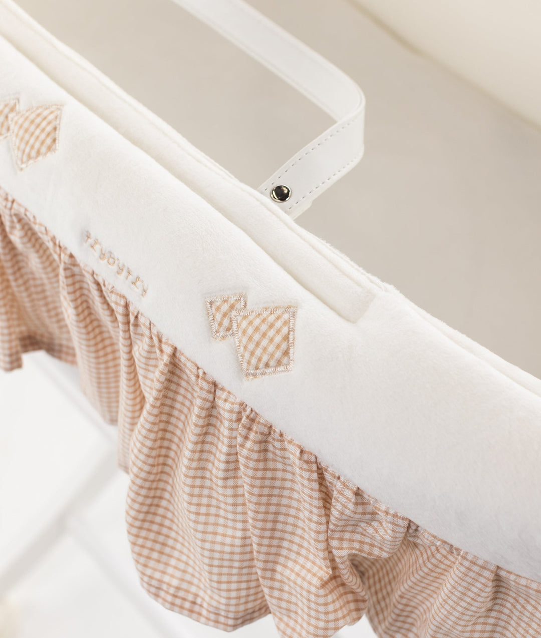 Beige Moses basket and wooden stand set for newborns