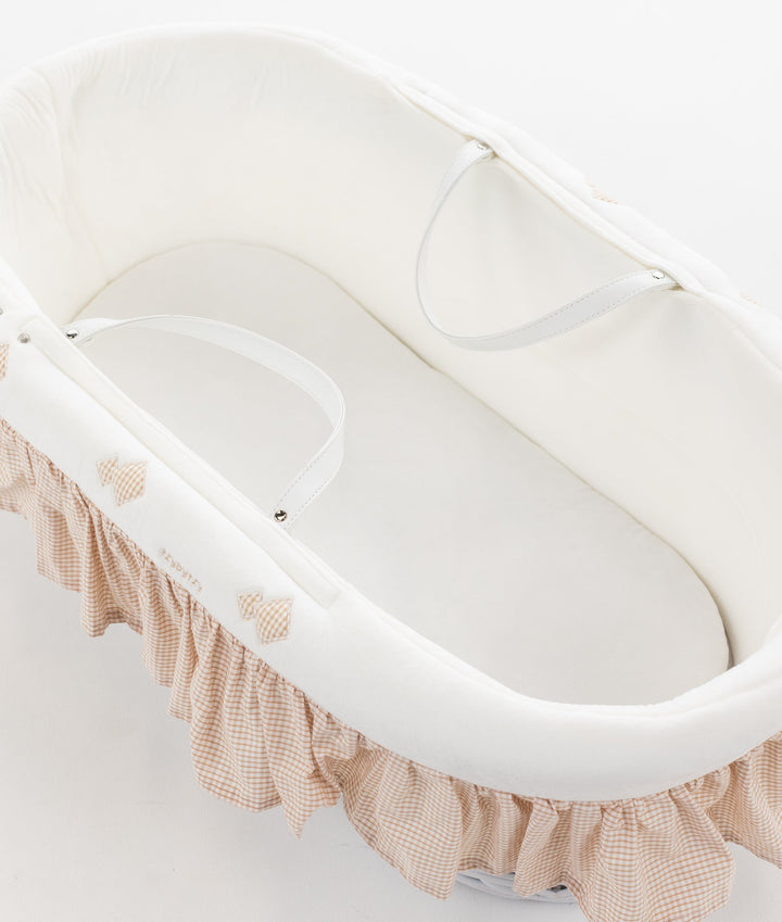Beige Moses basket and wooden stand set for newborns