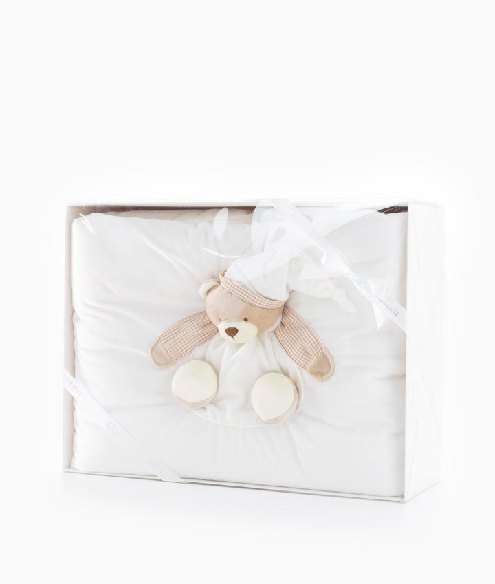 White and beige baby bassinet bedding
