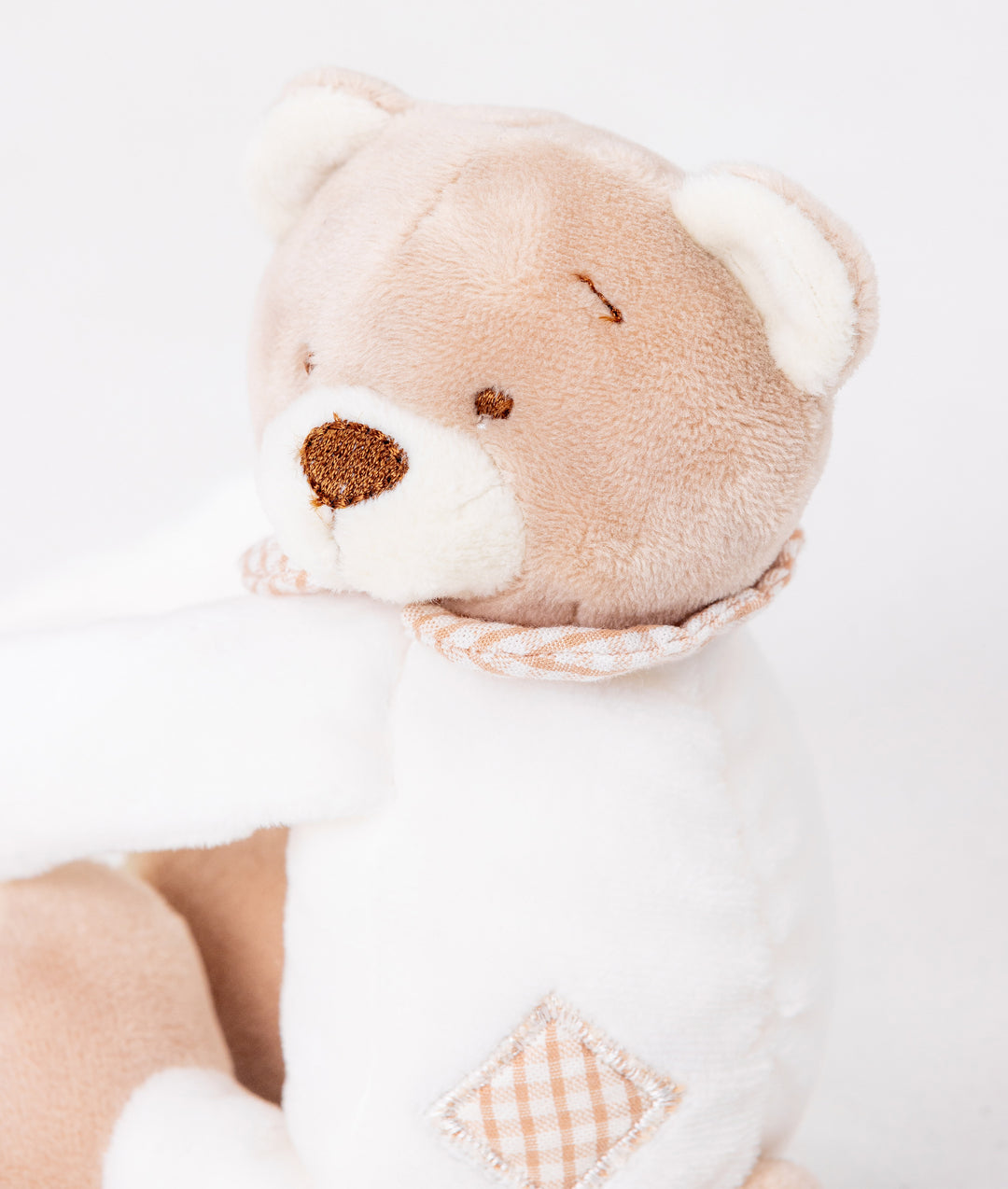 Beige and white bear curtain tieback for nursery