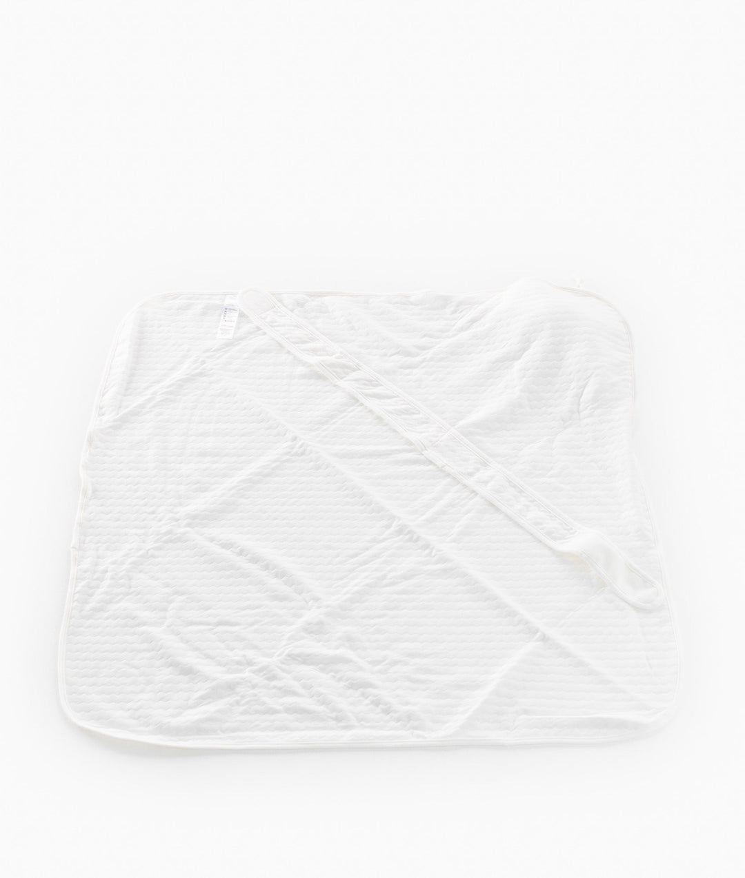 White and beige newborn swaddle blanket