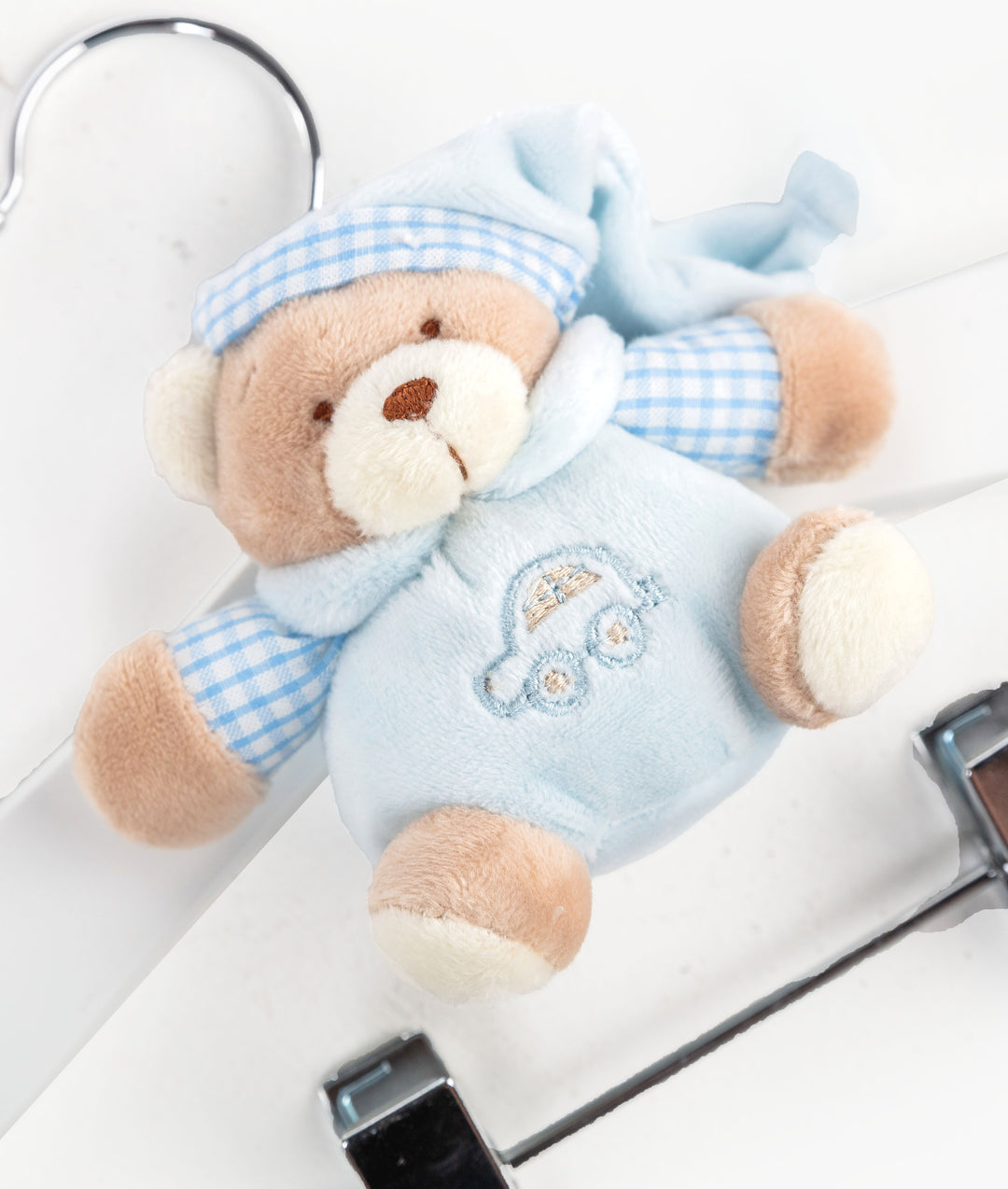 Blue wooden hanger with clips