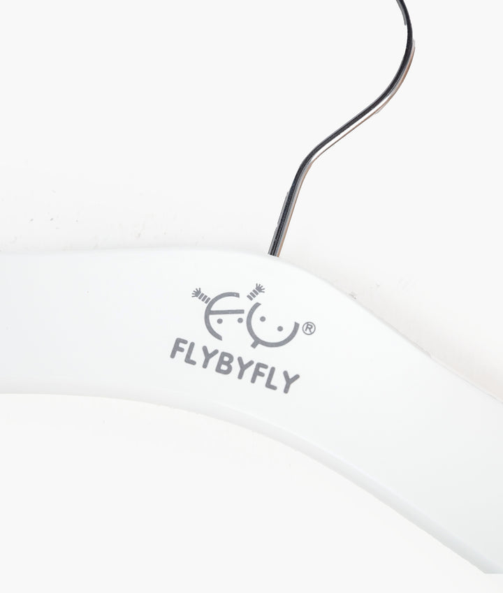 White and beige wooden hanger with clips
